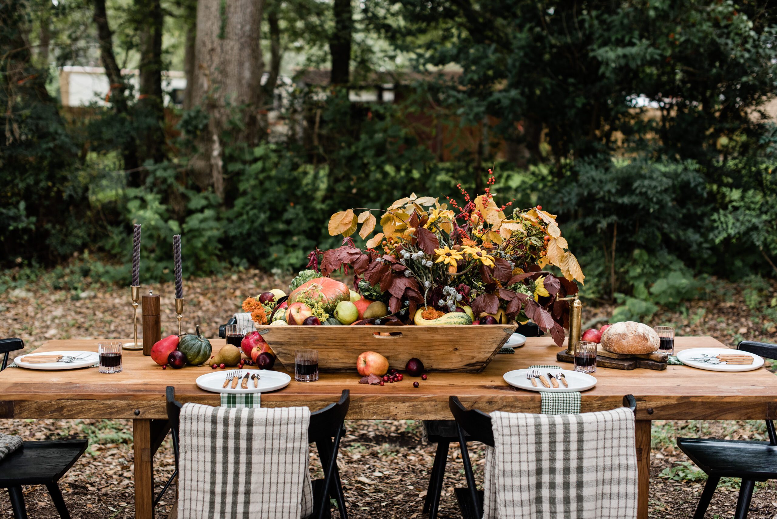 fall foliage, fruit and vegatable centerpiece in an antique dough bowl