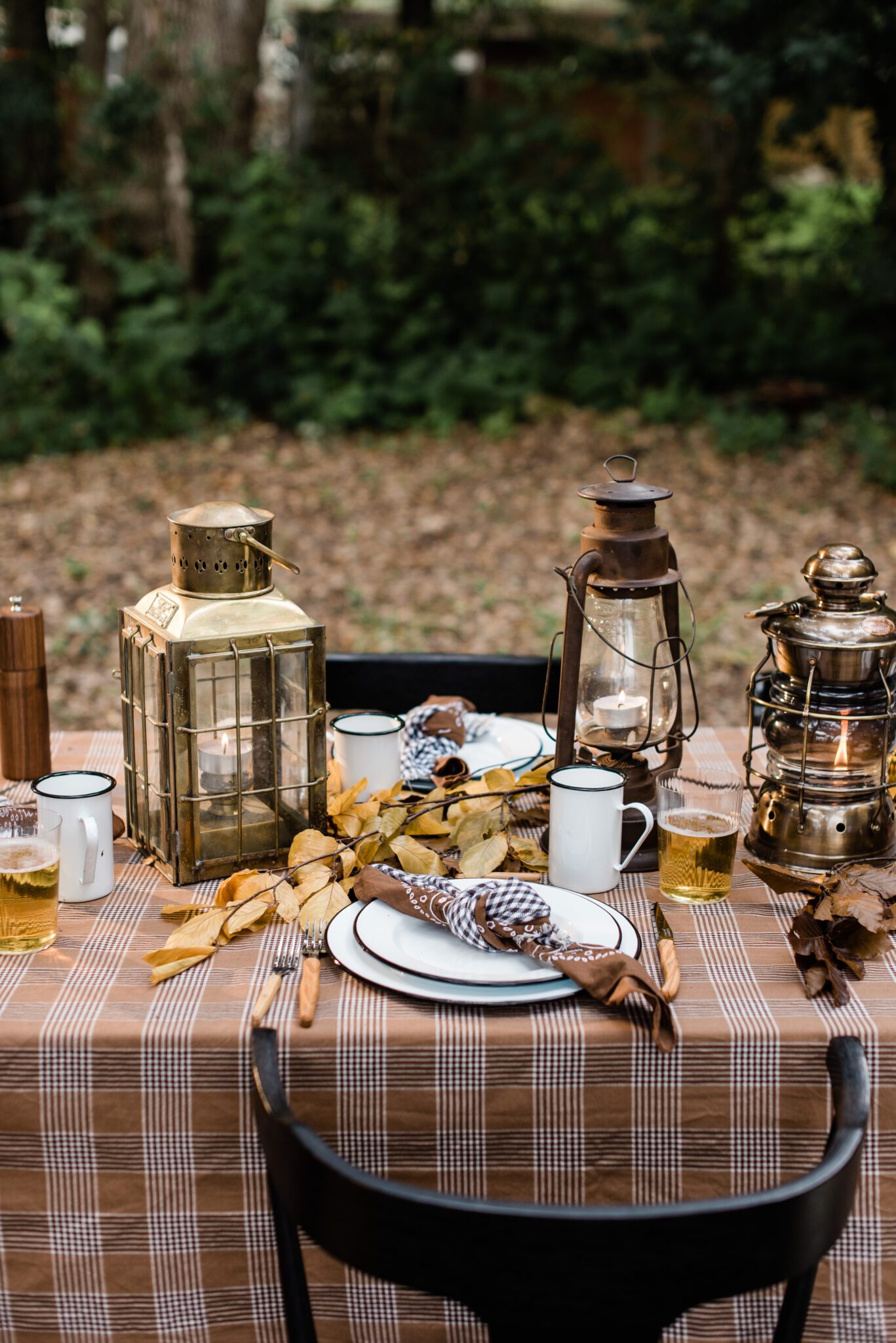 rustic camp inspired outdoor table design with fall color palette
