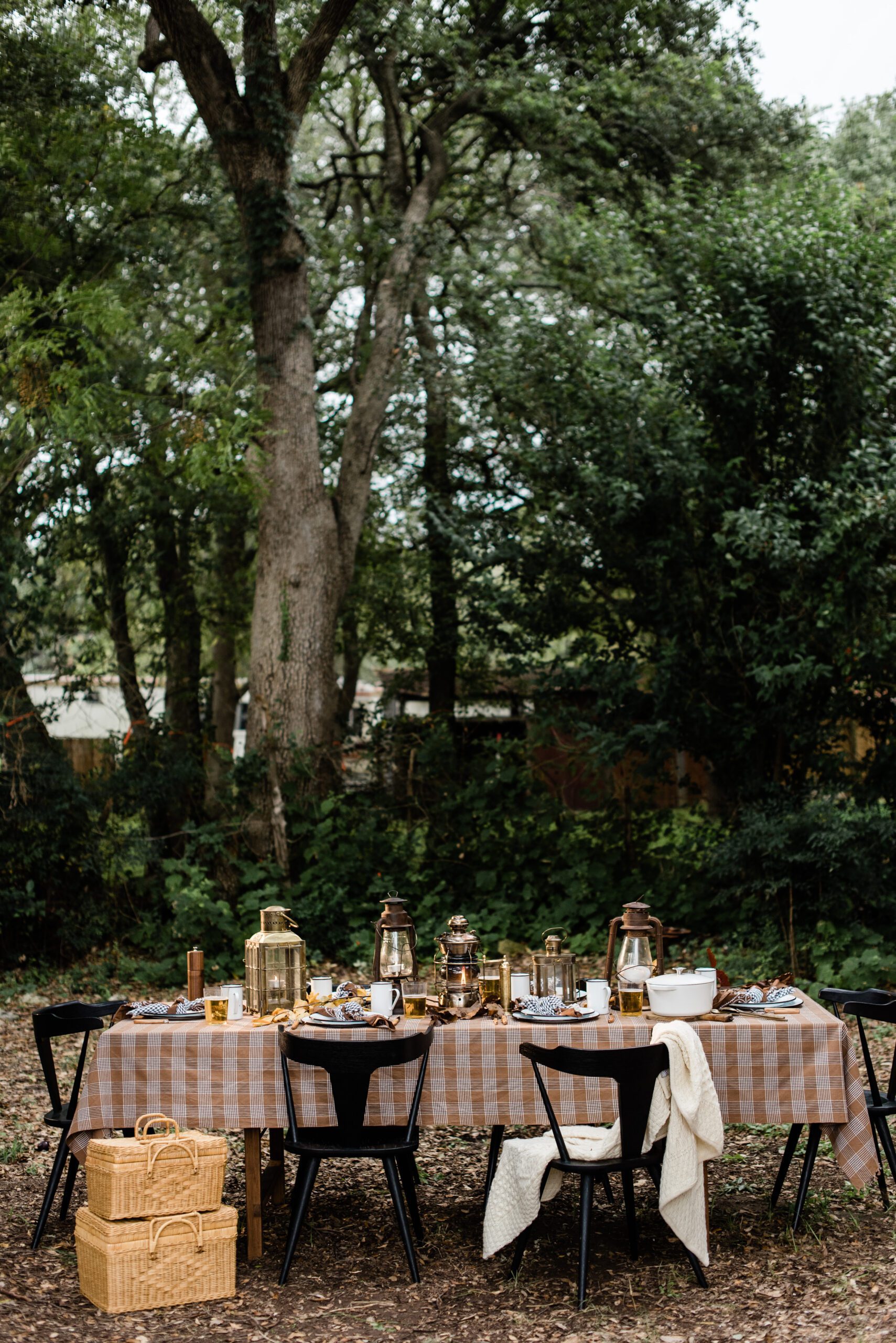 rustic camp inspired outdoor table design with brown and copper earth tones