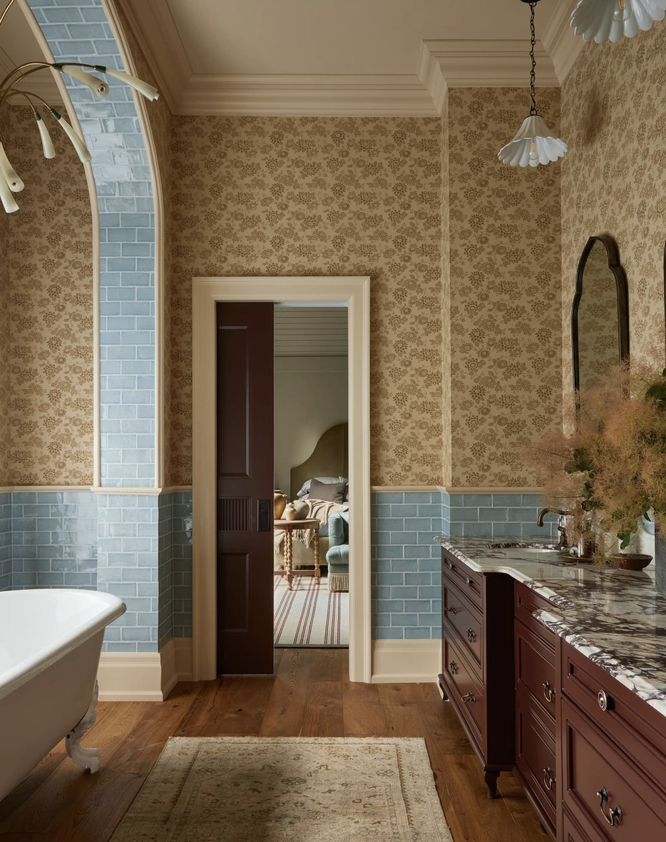 Contrast trim trends with yellow wallpaper and blue tile