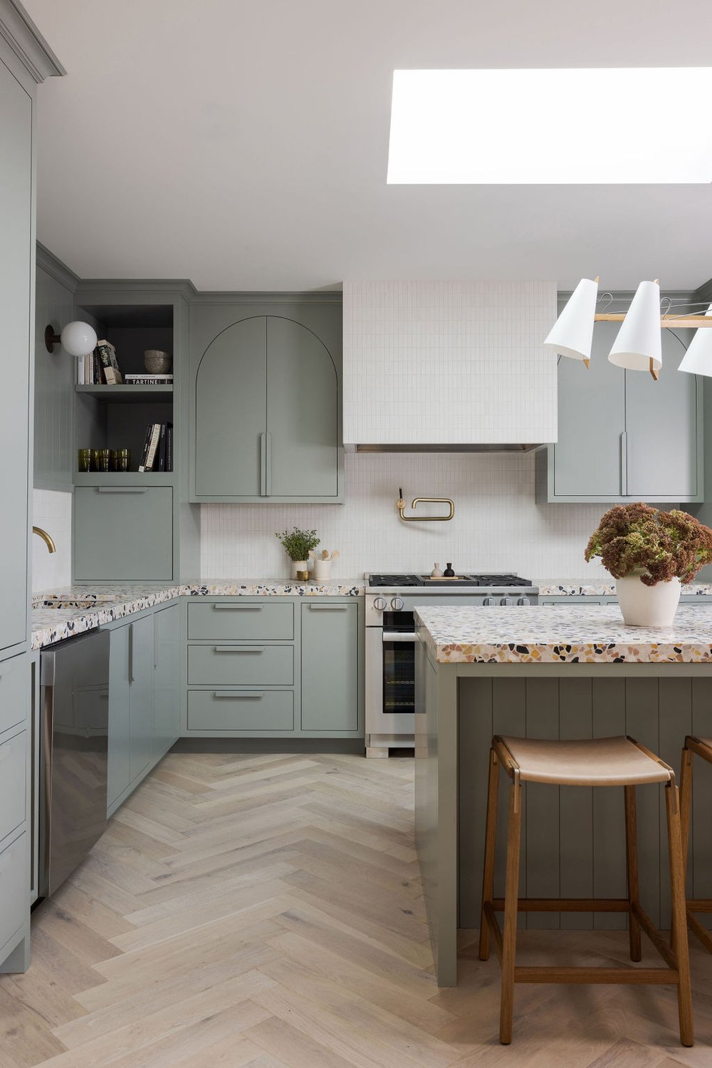 Cool blue modern kitchen in neutral family home by Katie Monkhouse