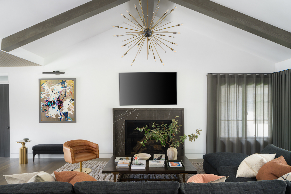 Modern living room design with vaulted ceiling and midcentury elements