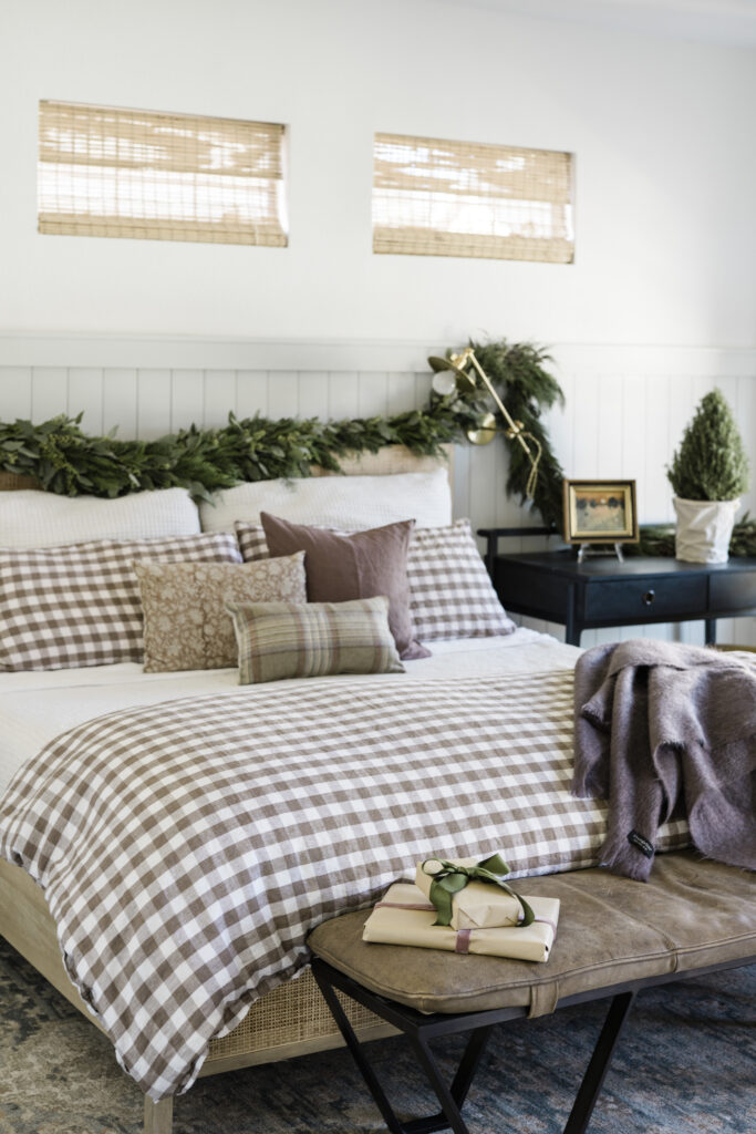 Fresh greenery garland in bedroom, holiday home tour