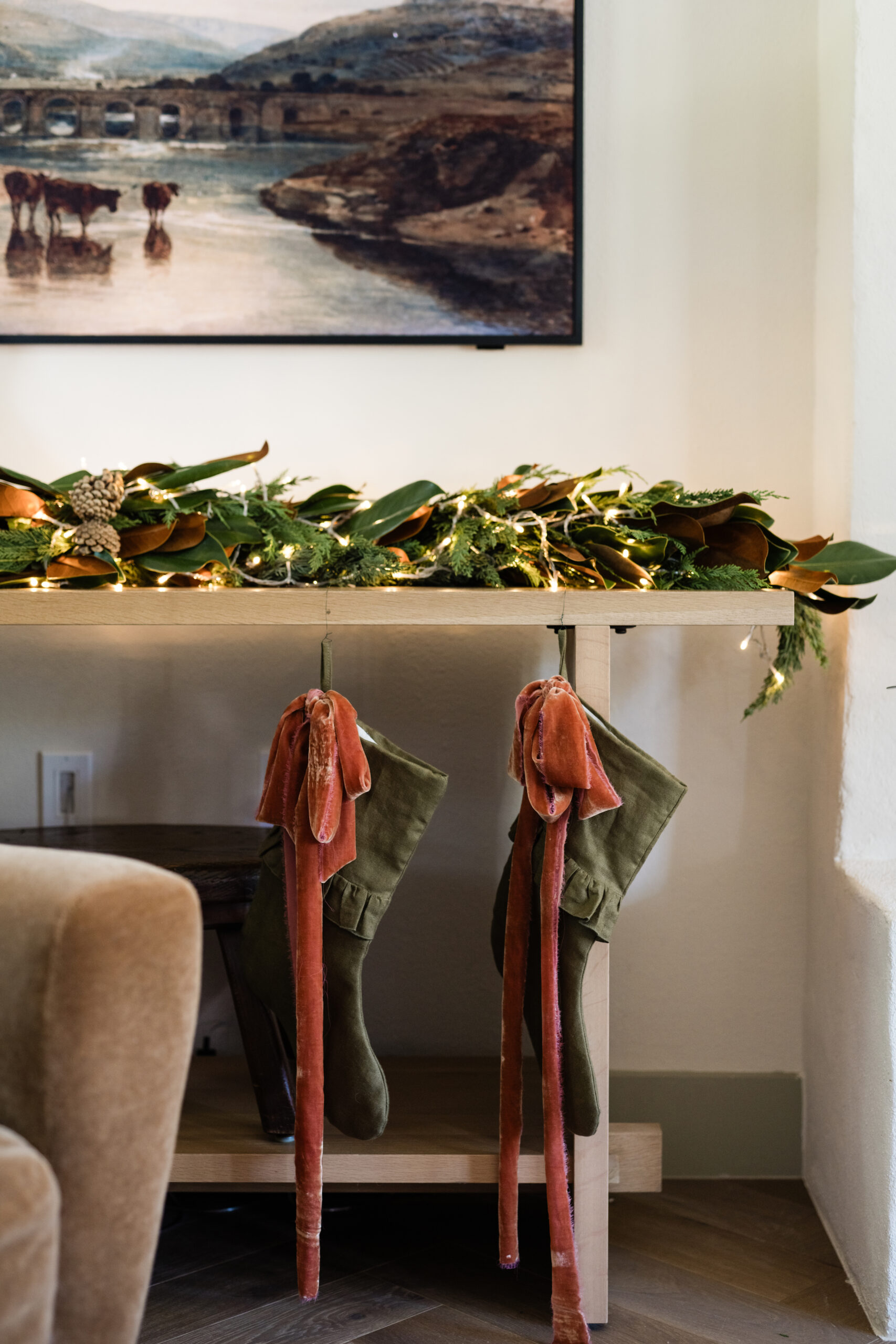 green velvet stockings and magnolia garland decorations