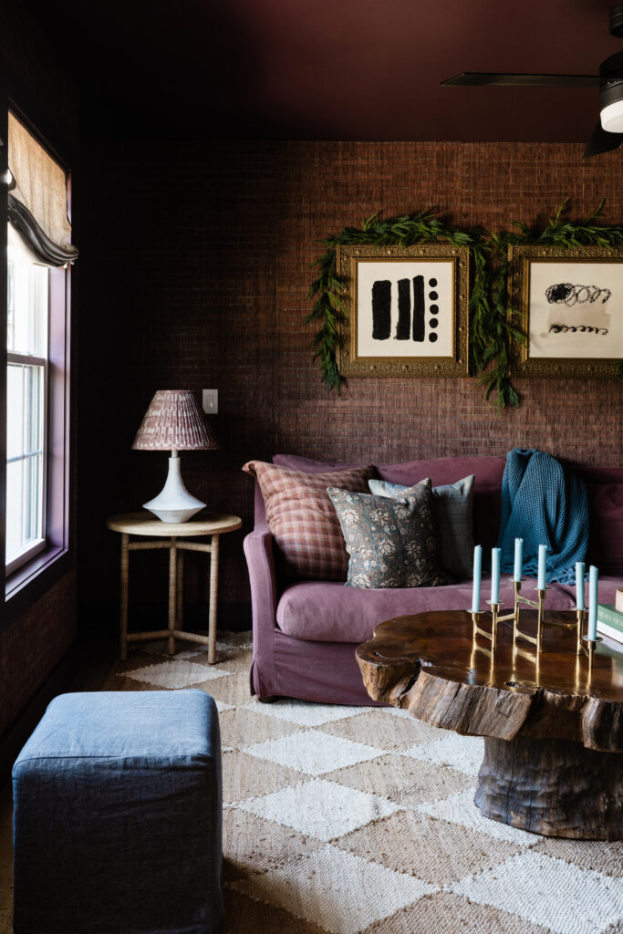 moody purple wallpaper with cypress garland holiday decor