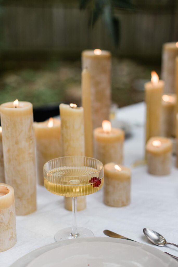 elegant candlelit dinner table design in neutrals