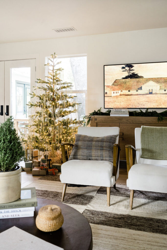 tinsel decorating the Christmas tree living room holiday decor ideas