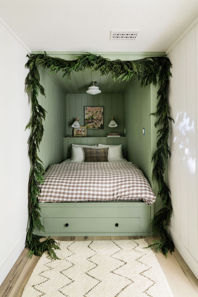 green garland  and gingham holiday bed nook