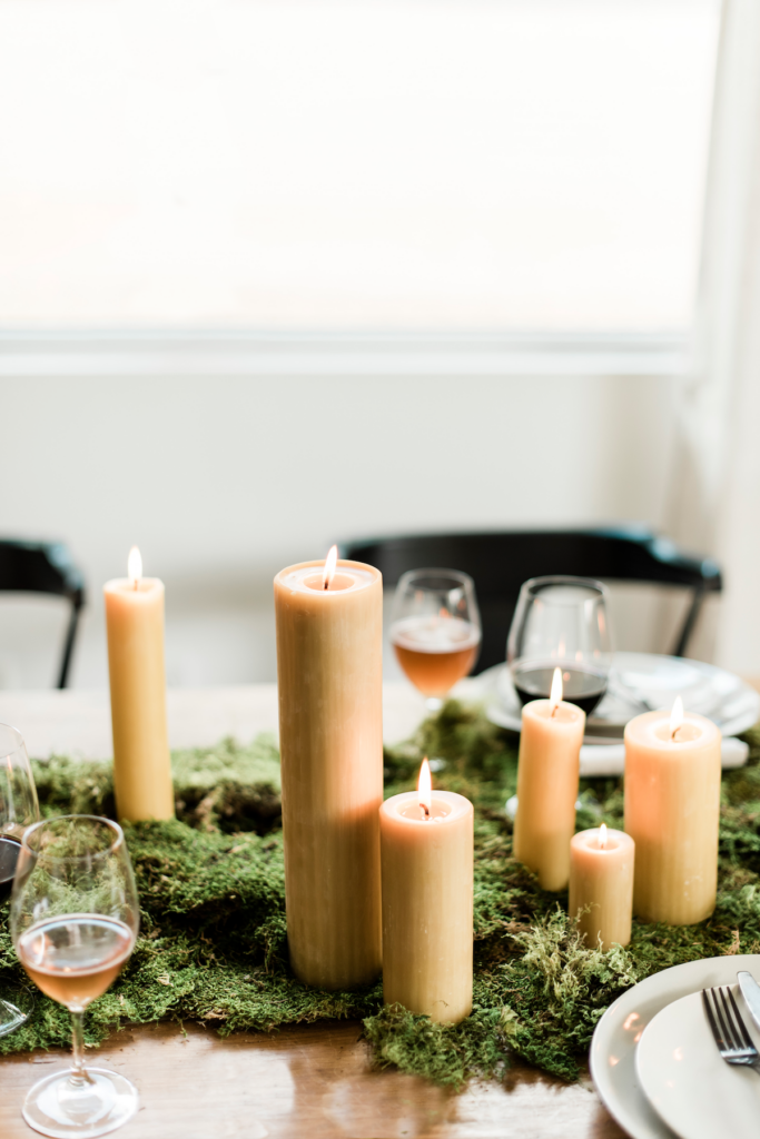 Moss table runner and beeswax pillar candle centerpiece decor