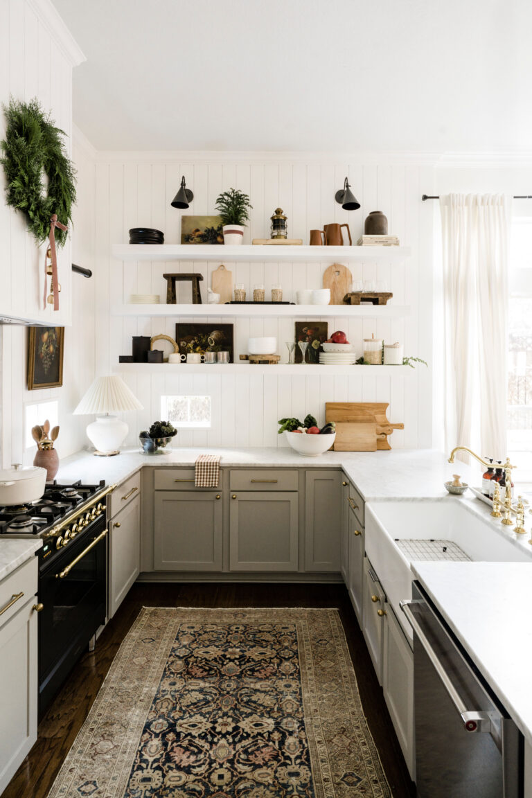 Fresh wreath over kitchen stove, holiday home tour
