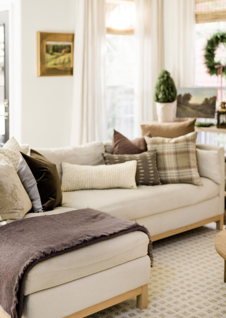 Linen sofa holiday decor with earthy mauve palette, holiday home tour