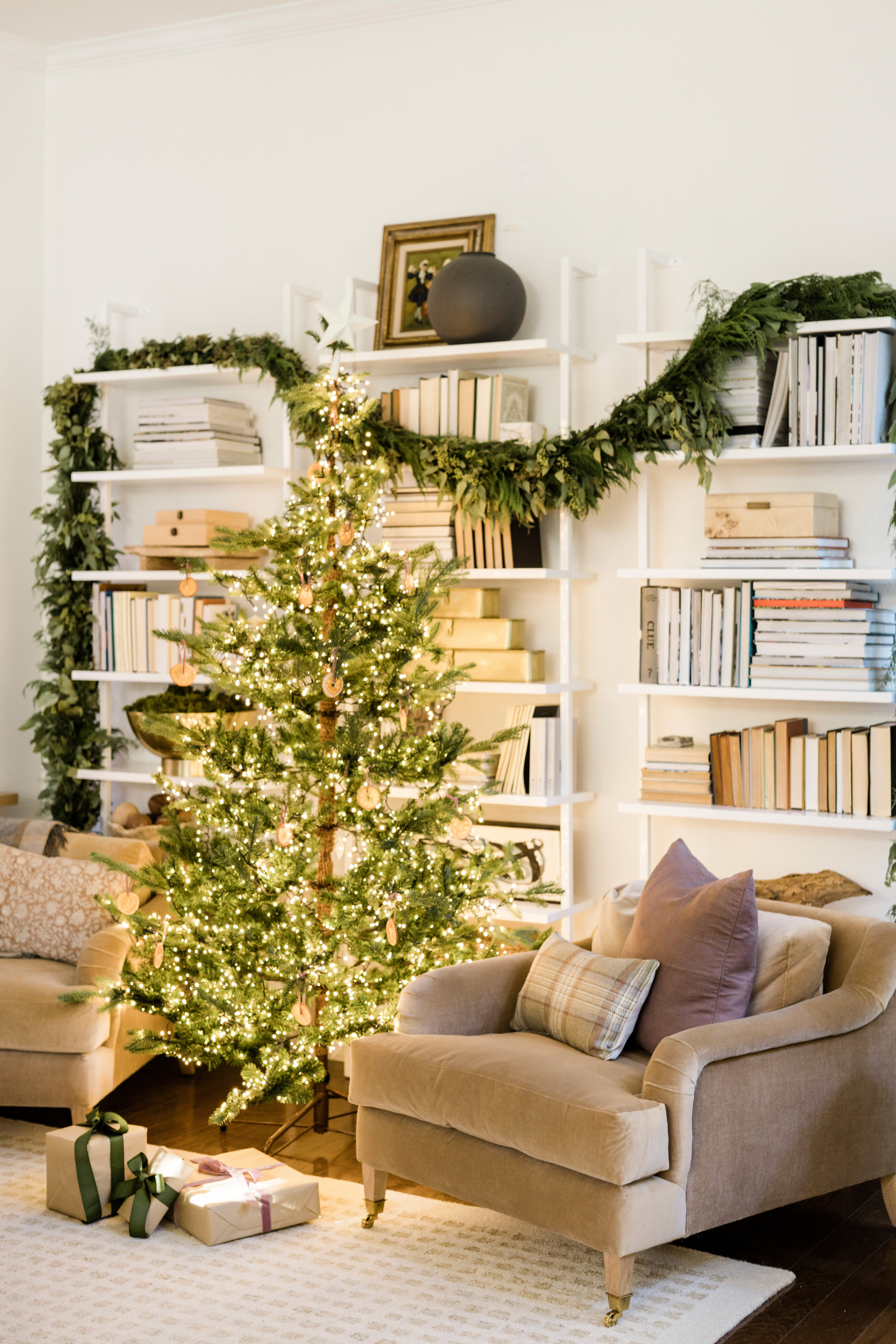 neutral Living room holiday decor with fresh greens, holiday home tour