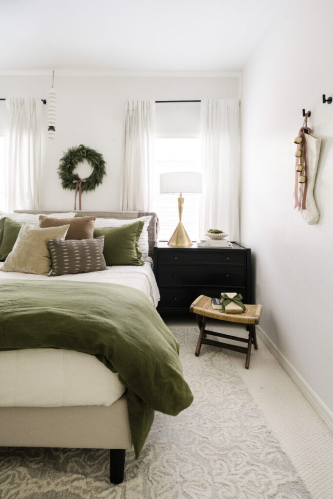 Bedroom wreath, ribbons, and bells, Subtle holiday decor in guest bedroom, holiday home tour