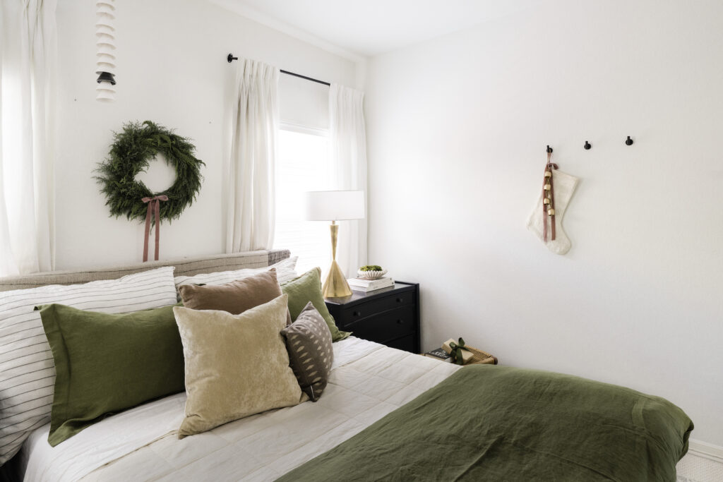 Bedroom wreath, ribbons, and bells, Subtle holiday decor in guest bedroom, holiday home tour