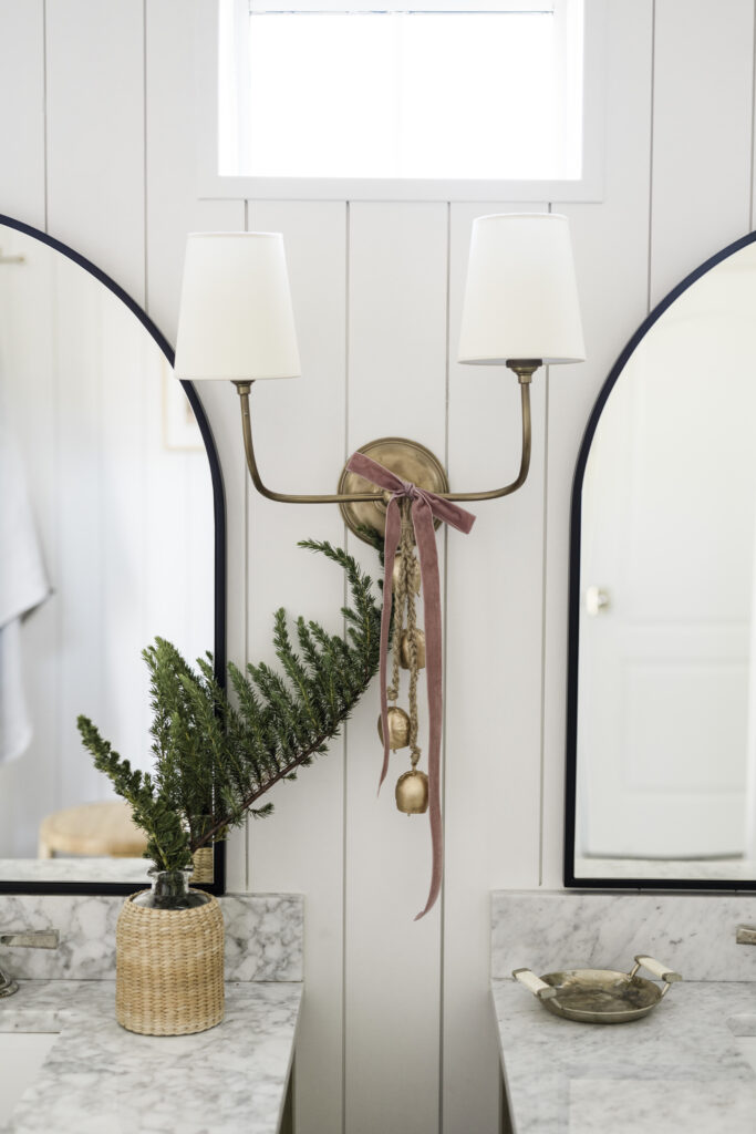 Bathroom holiday decorating ideas with ribbons and bells