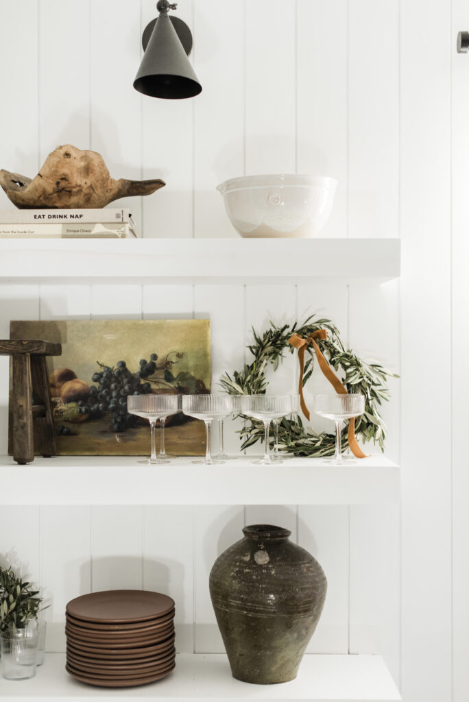 holiday kitchen shelf styling with small olive leaf wreath 