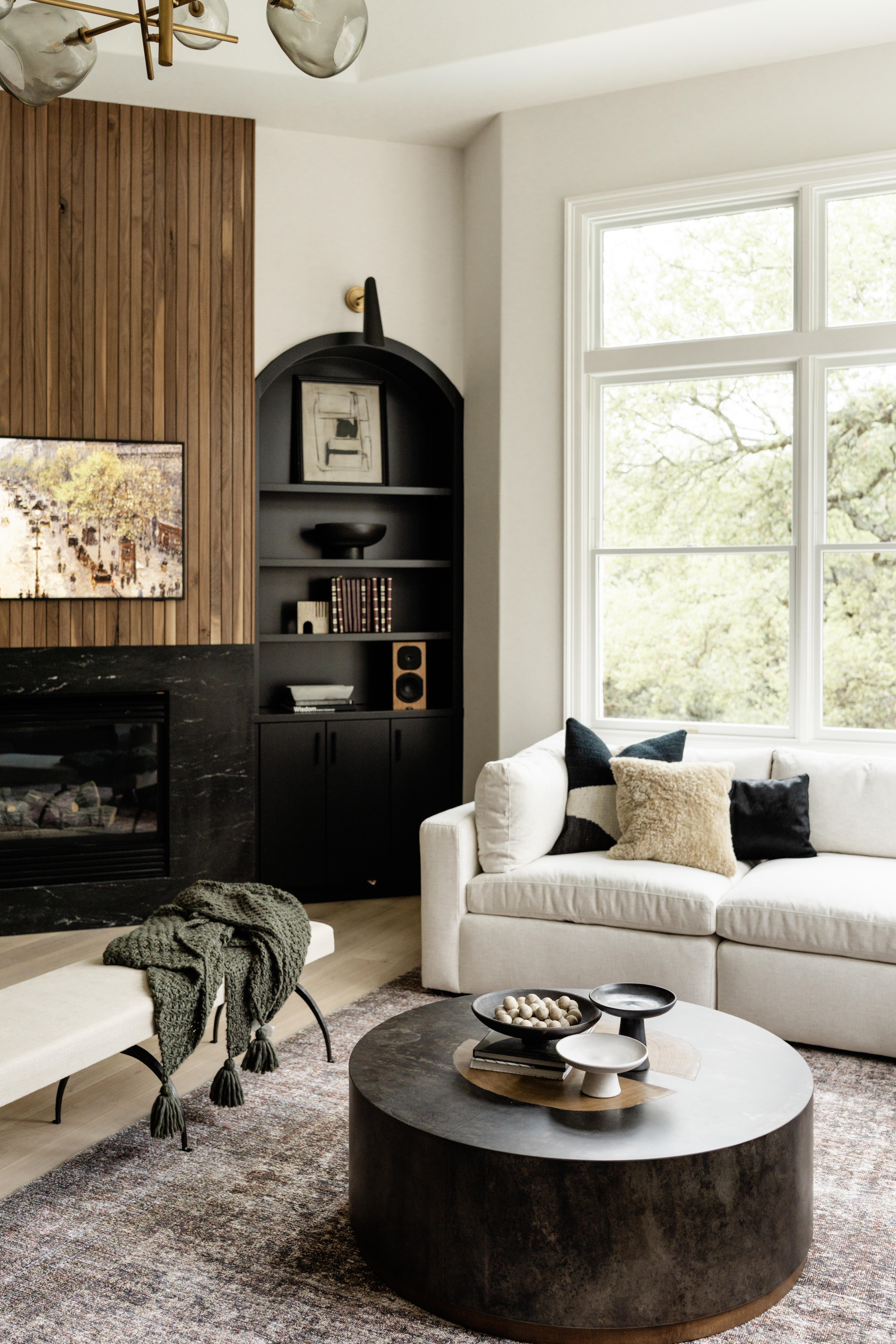 Living Room with Wooden, Black, and Cream Accents