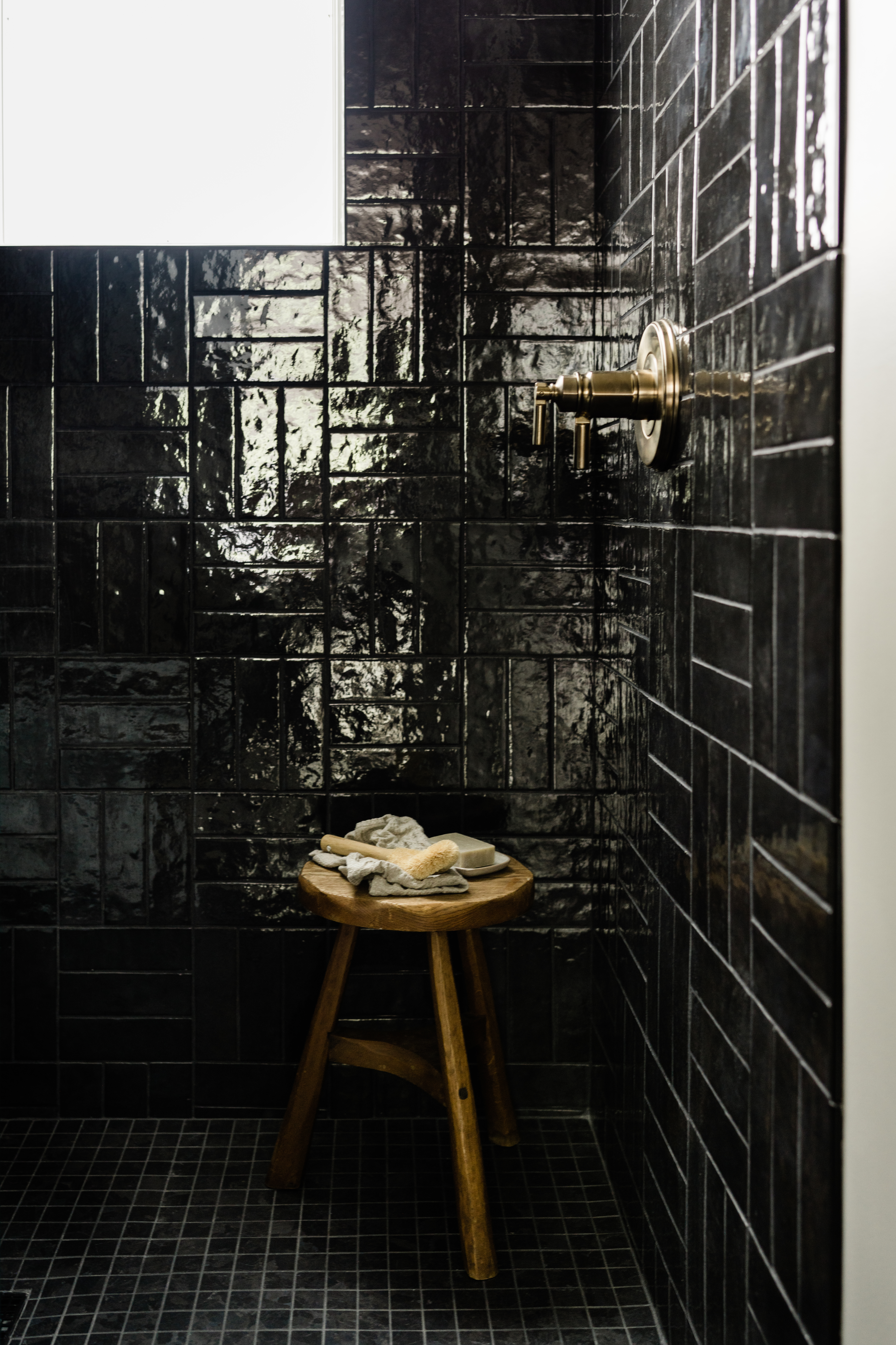 Standing Shower Stool with Black Tiling