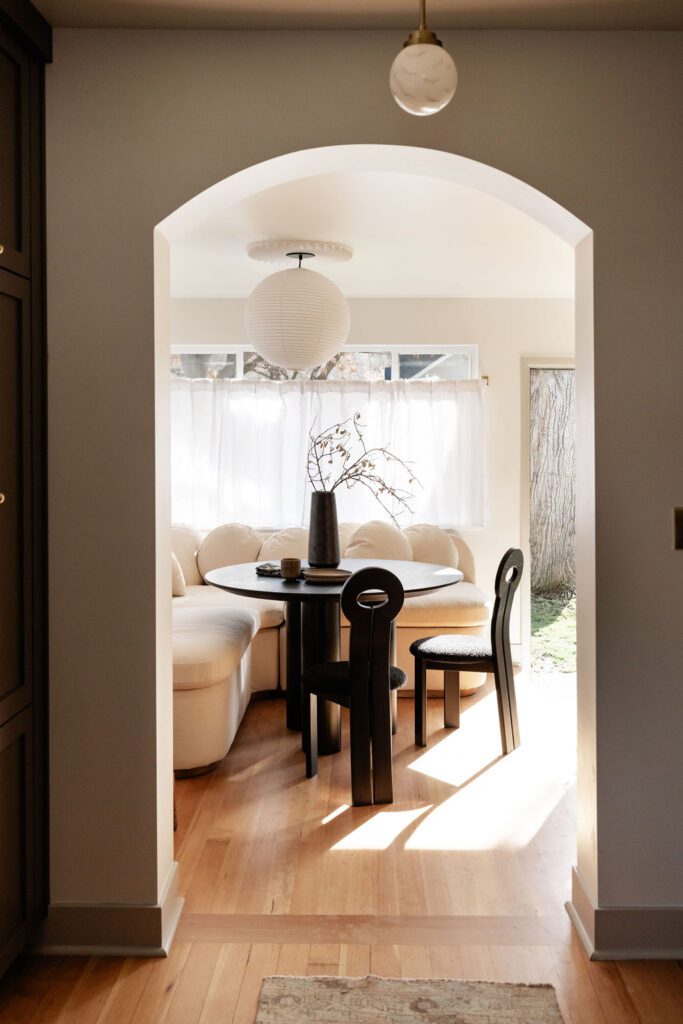 Archway into Dining Room with Fluffy Bench