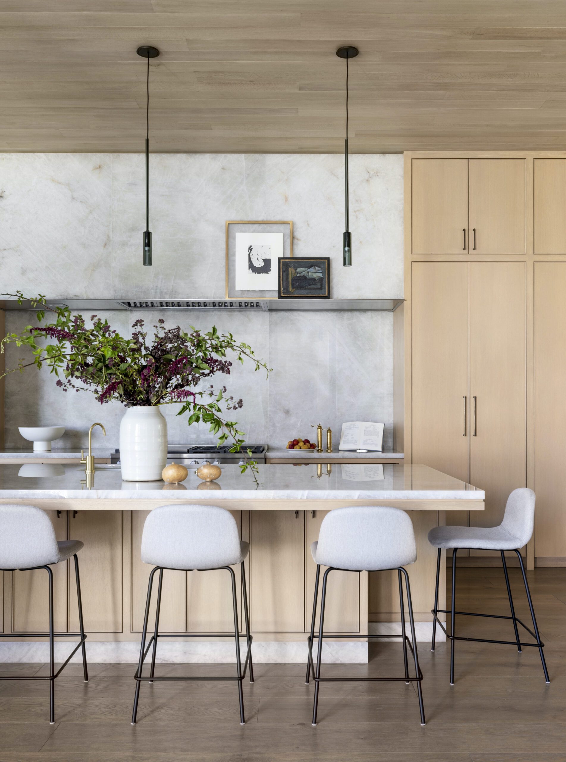 Modern organic kitchen design with white oak custom cabinetry