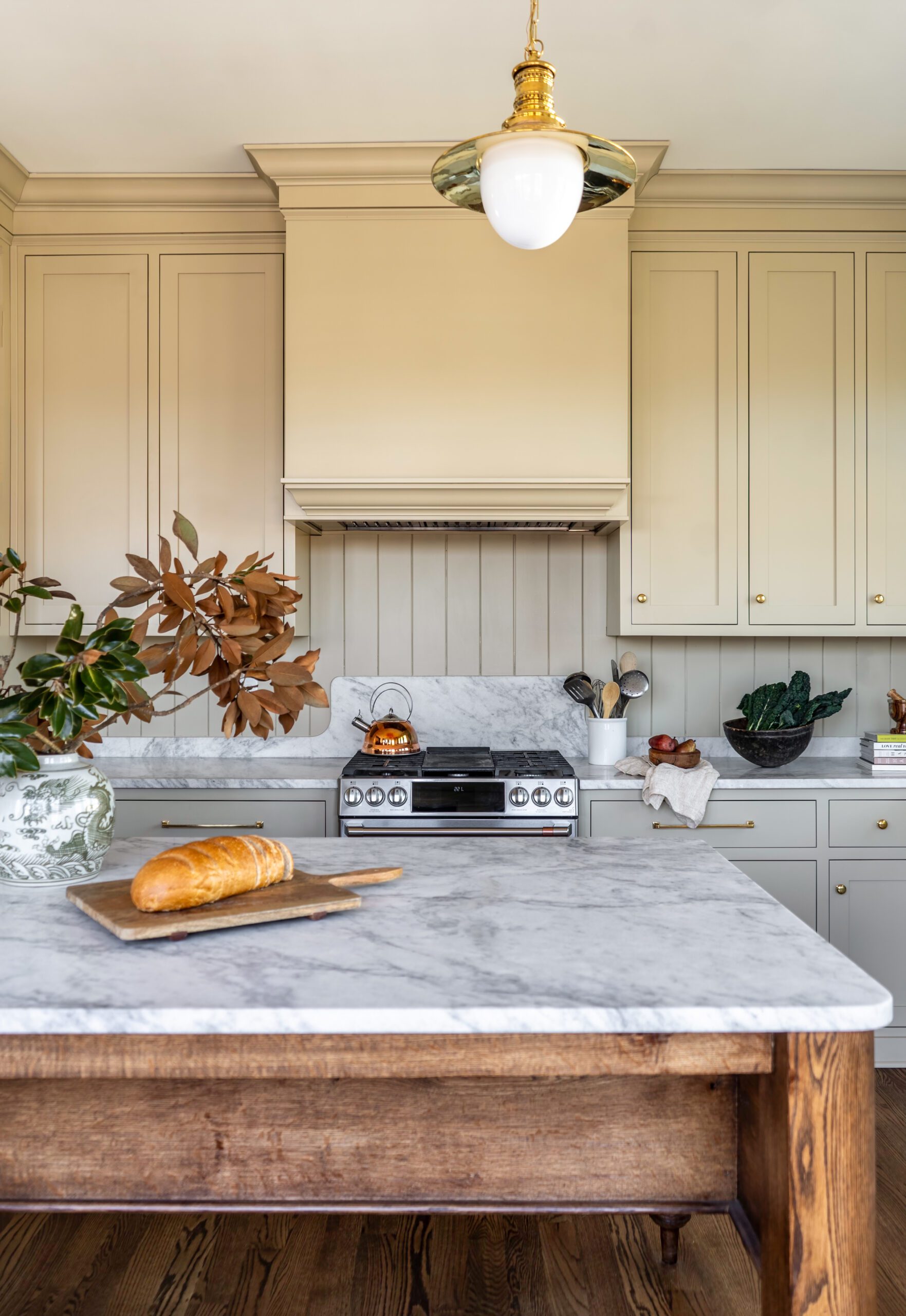 Kitchen Island in Neutral Cream Colored Cabinets