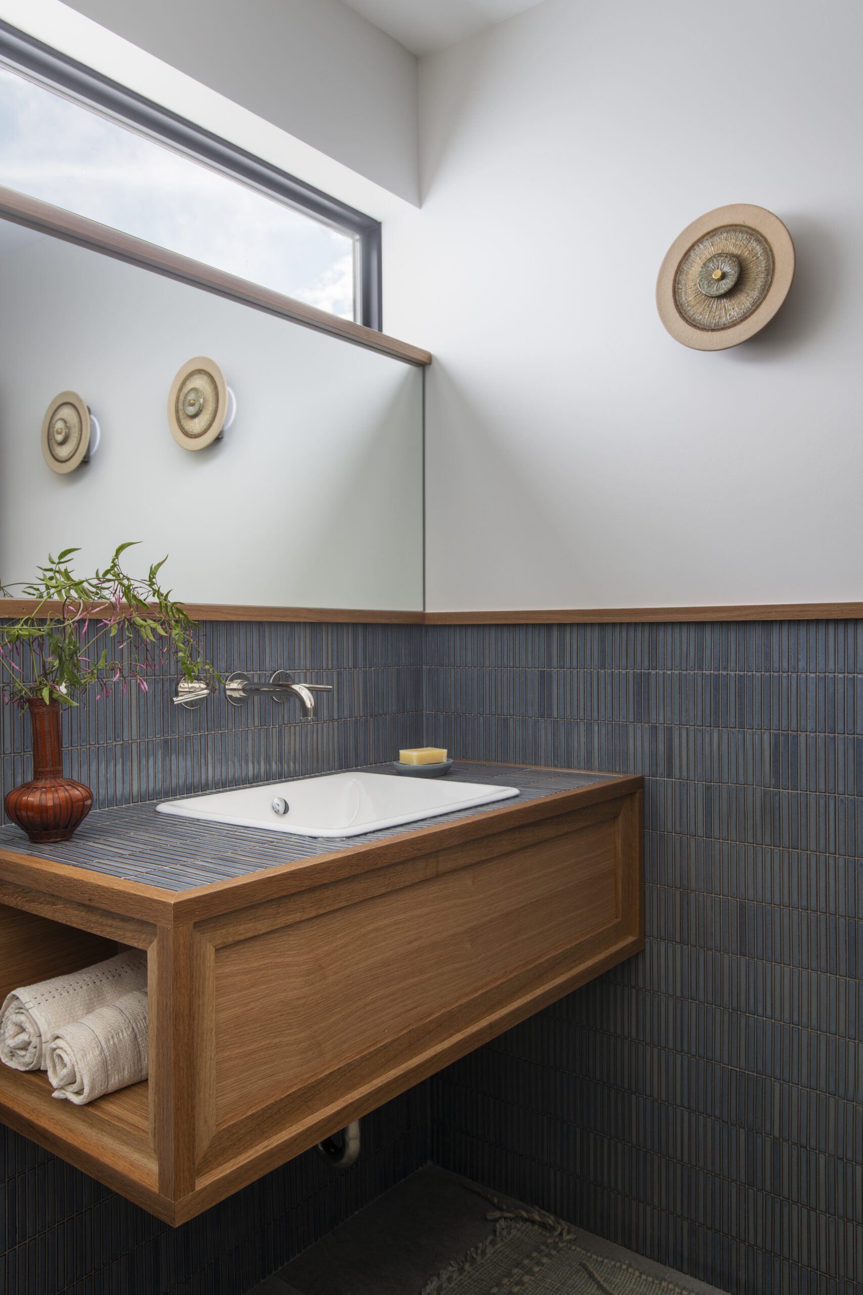 Dark Tile and Wooden Vanity