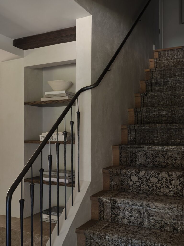 Limewash wall treatments in the stairwell