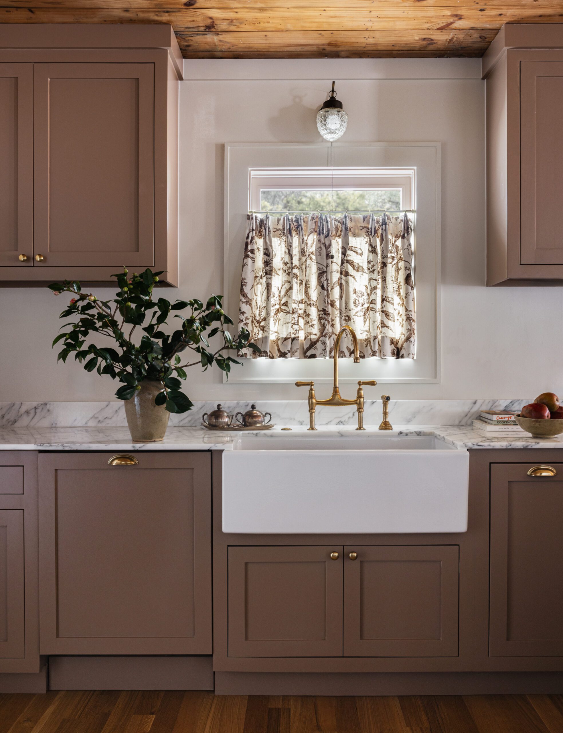 Farmhouse Sink And Curtained Window