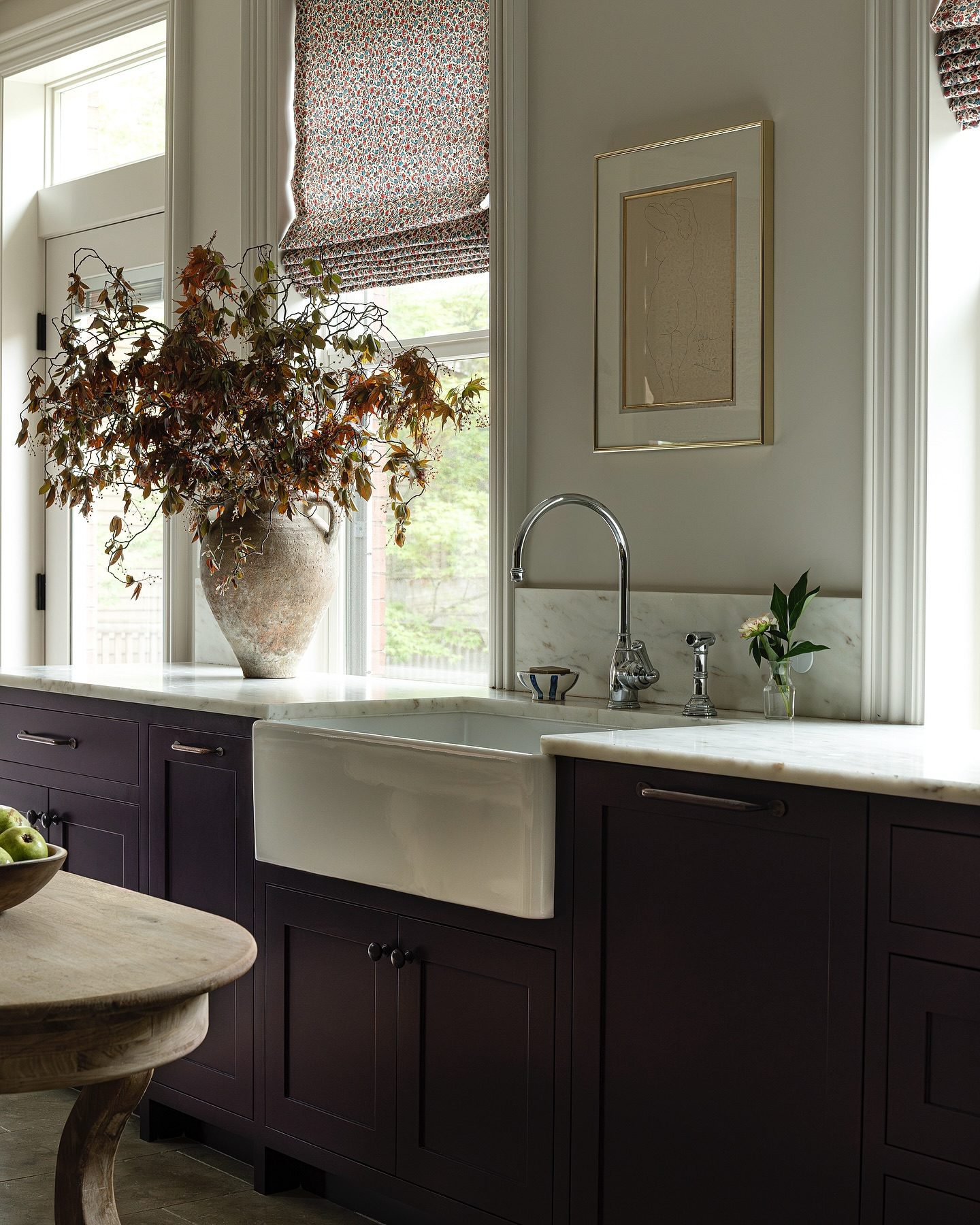 Purple kitchen cabinetry in a fall design inspired home