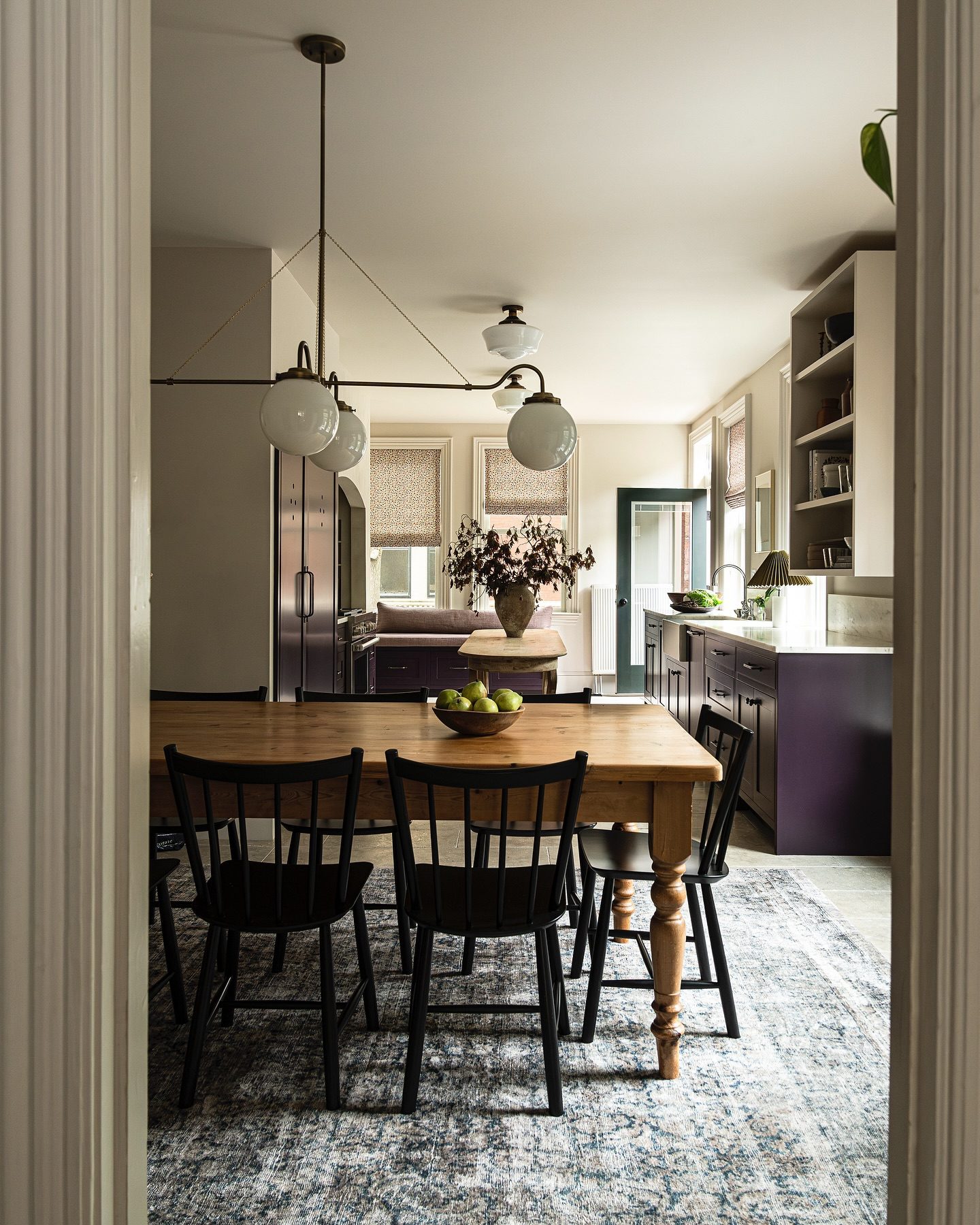 Purple kitchen cabinetry in a fall design inspired home