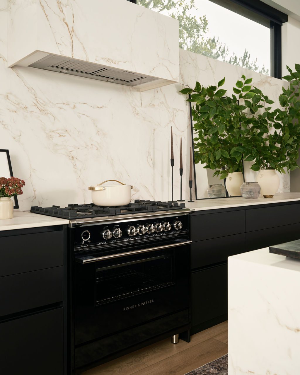 Marble Backsplash with Black Kitchen Cabinets