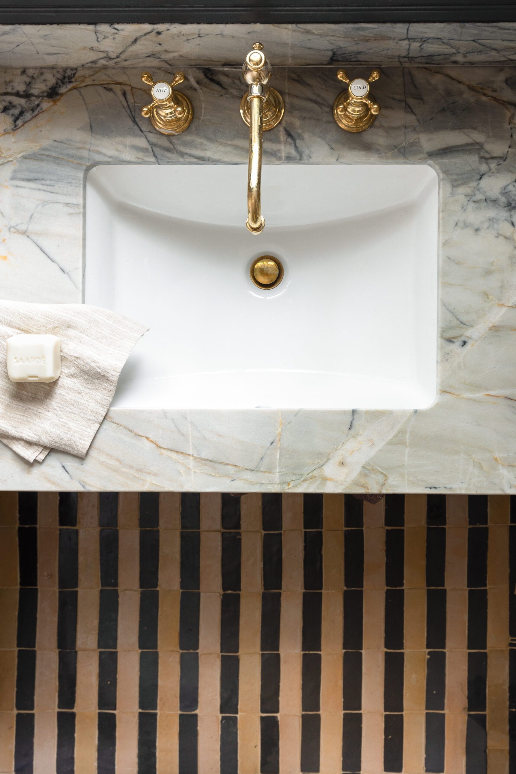 Marble Bathroom Vanity with Striped Tiling