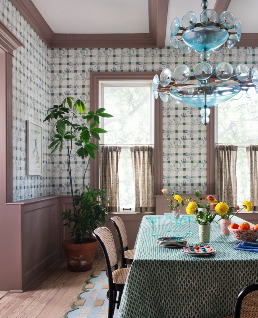 Mauve contrast trim in a dining room designed by Kim West