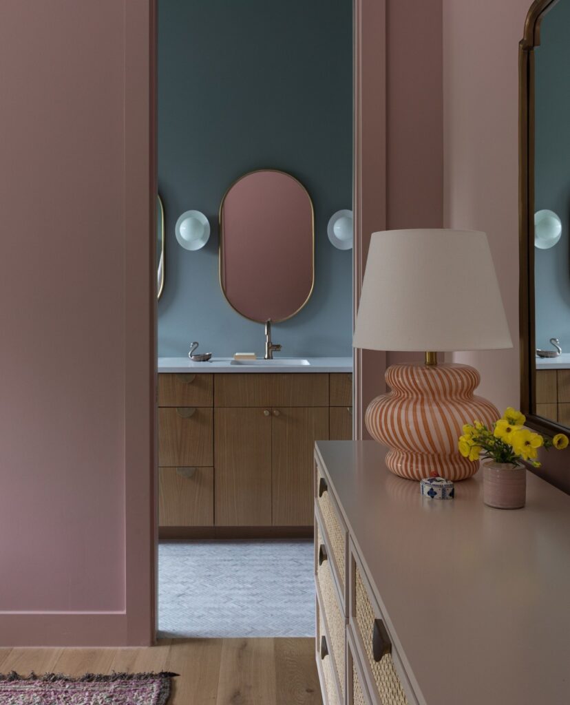 Mauve painted walls in a modern bedroom by Shannon Eddings