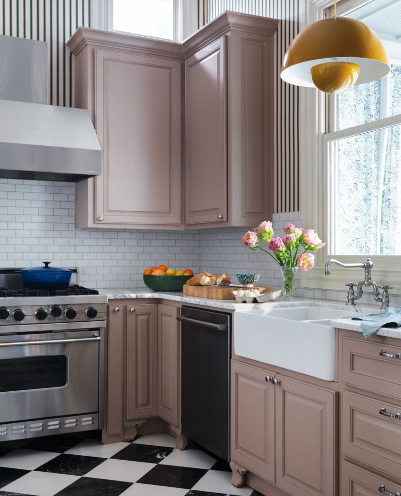 Mauve cabinets in a kitchen designed by Kim West