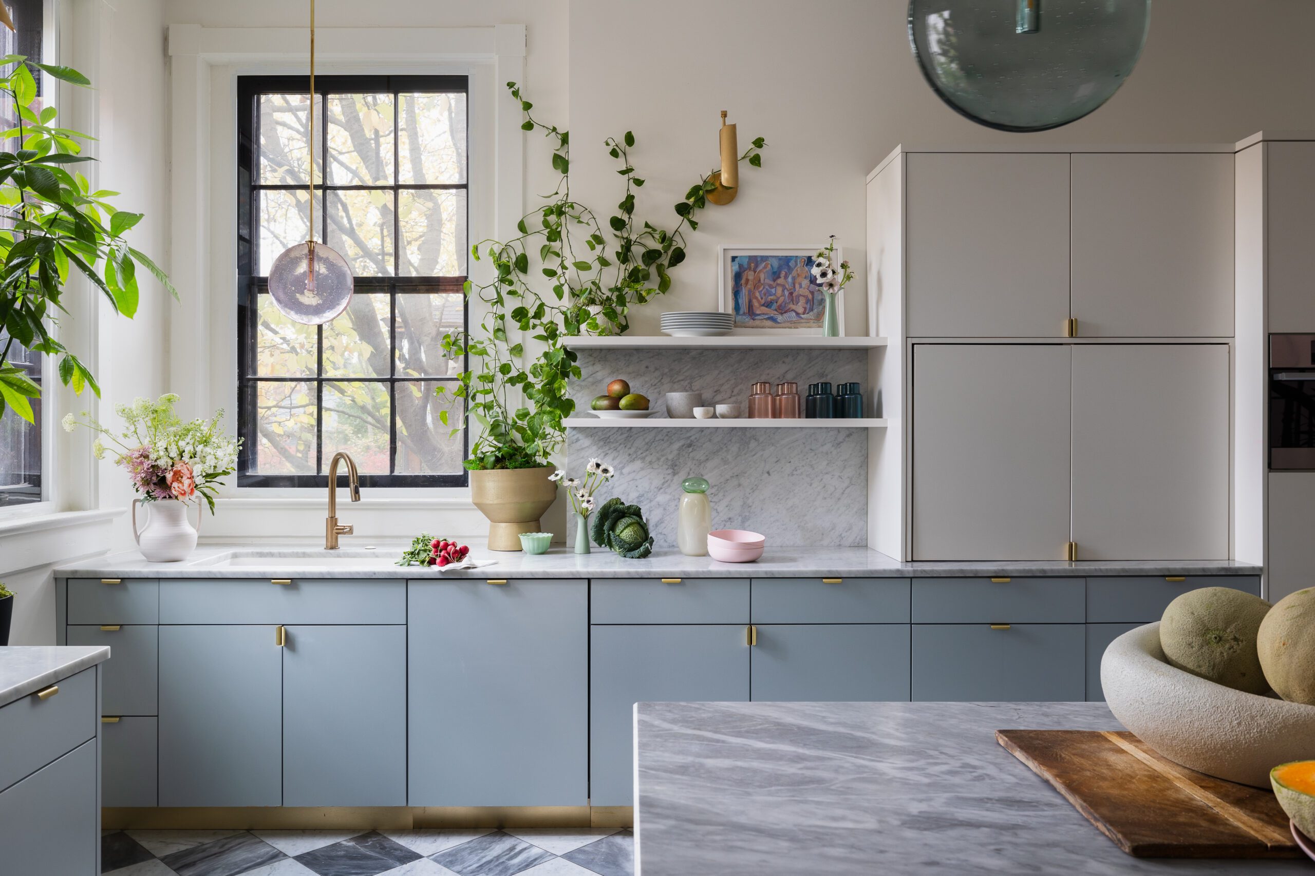Blue Kitchen Cabinets with Plants