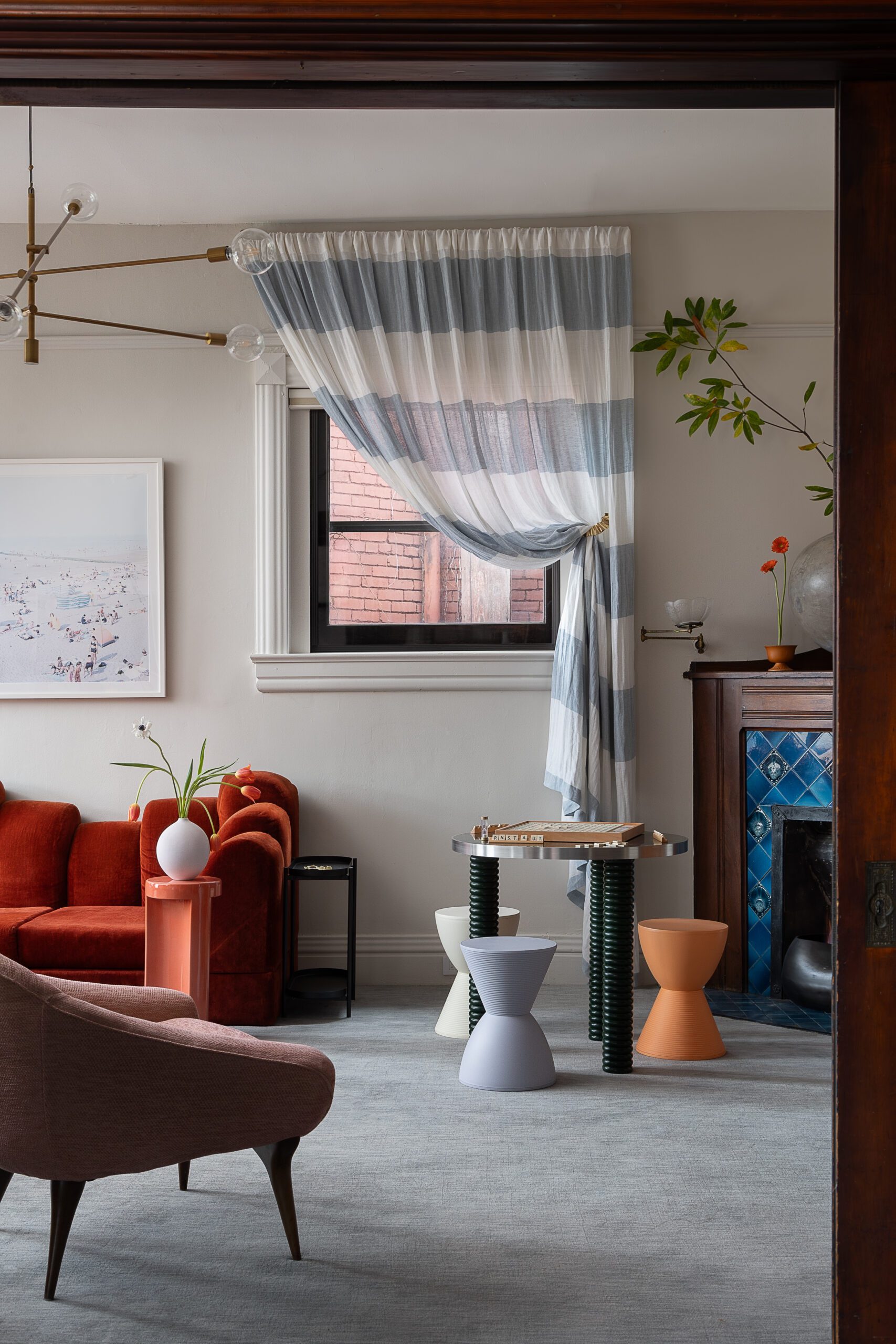 Striped Drapes and Blue Tiled Fireplace