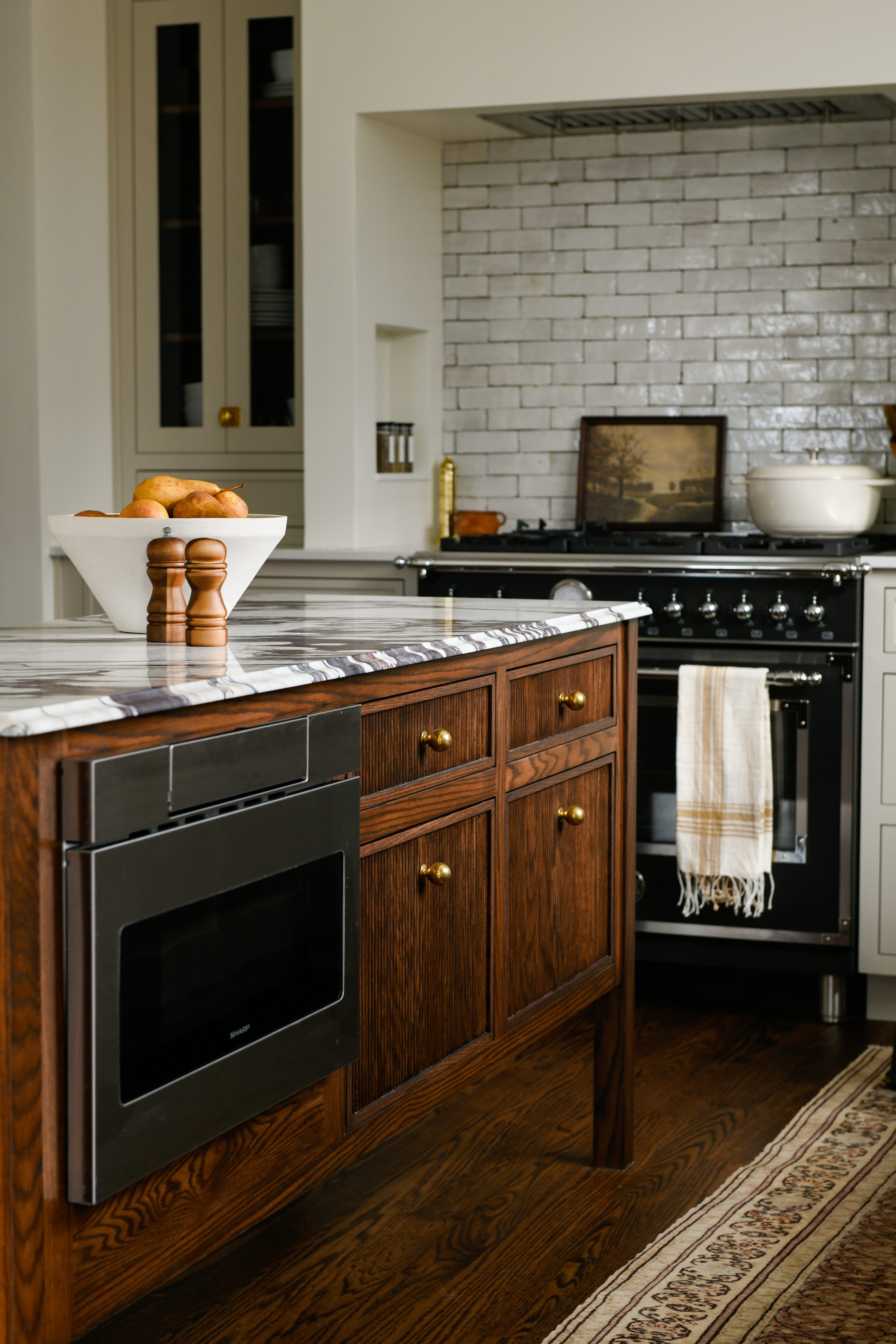 Dark Wooden Island with Marble Countertops