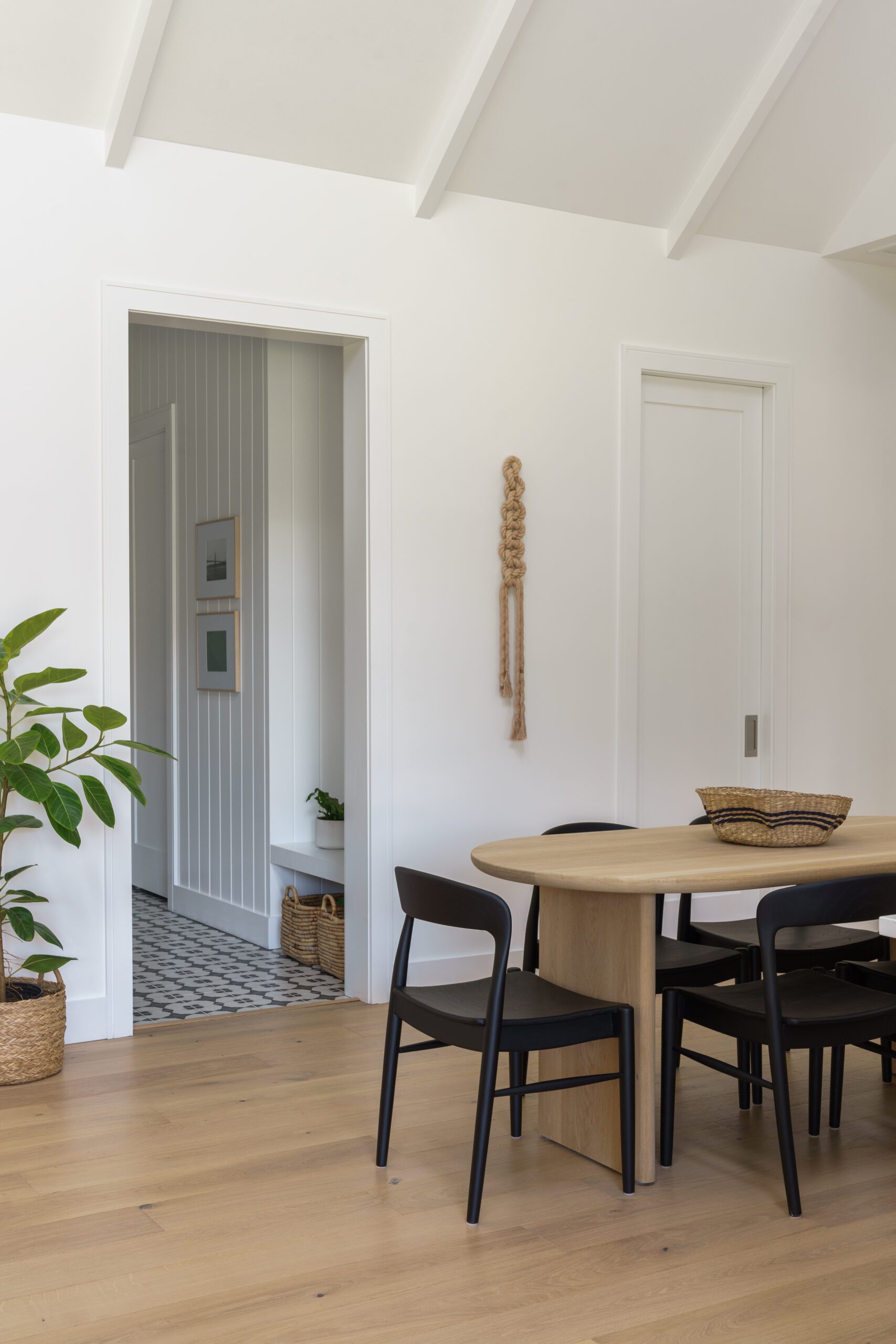 Dining Table and Tiled Hallway