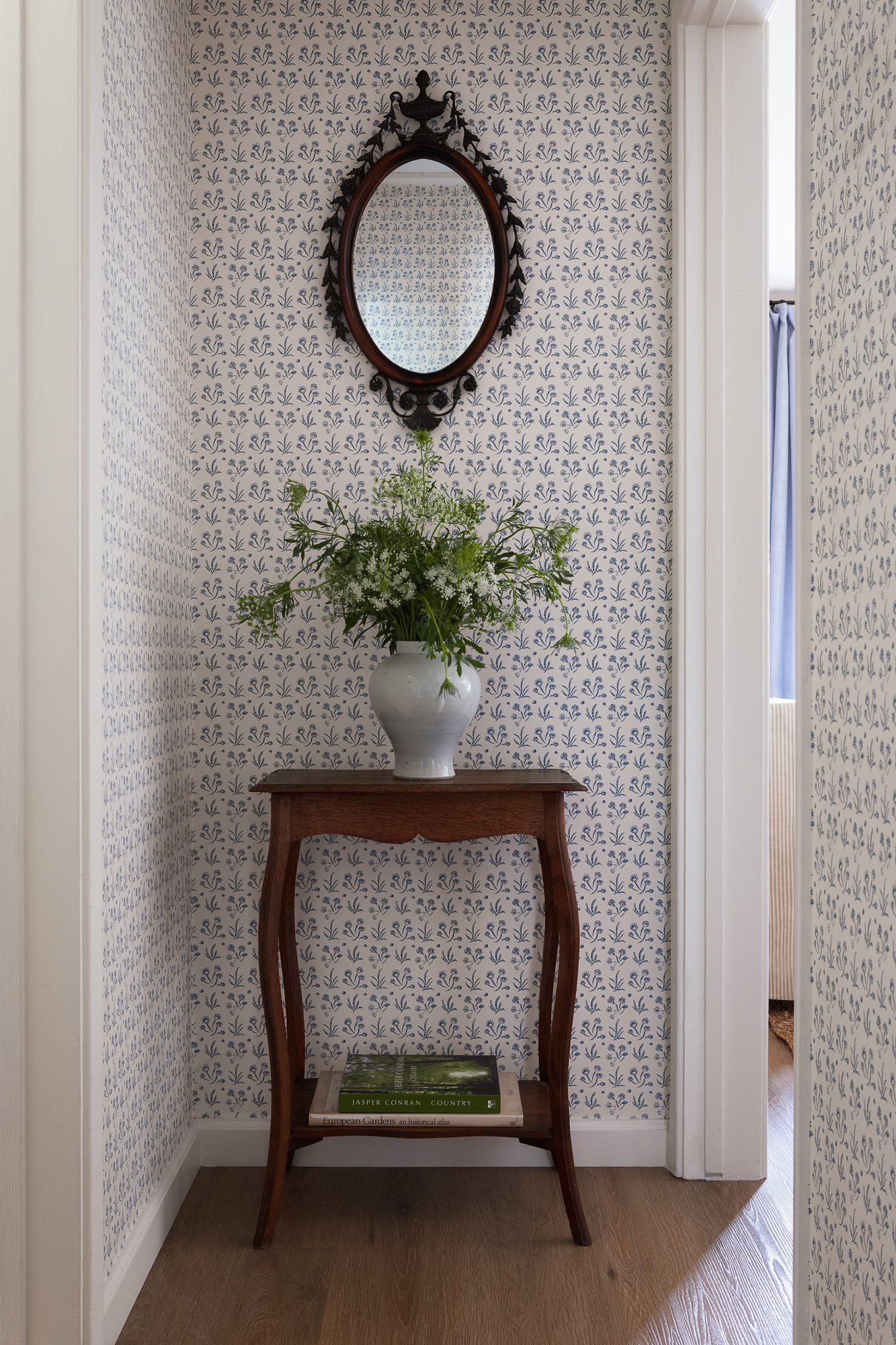 Blue Wallpapered Hallway