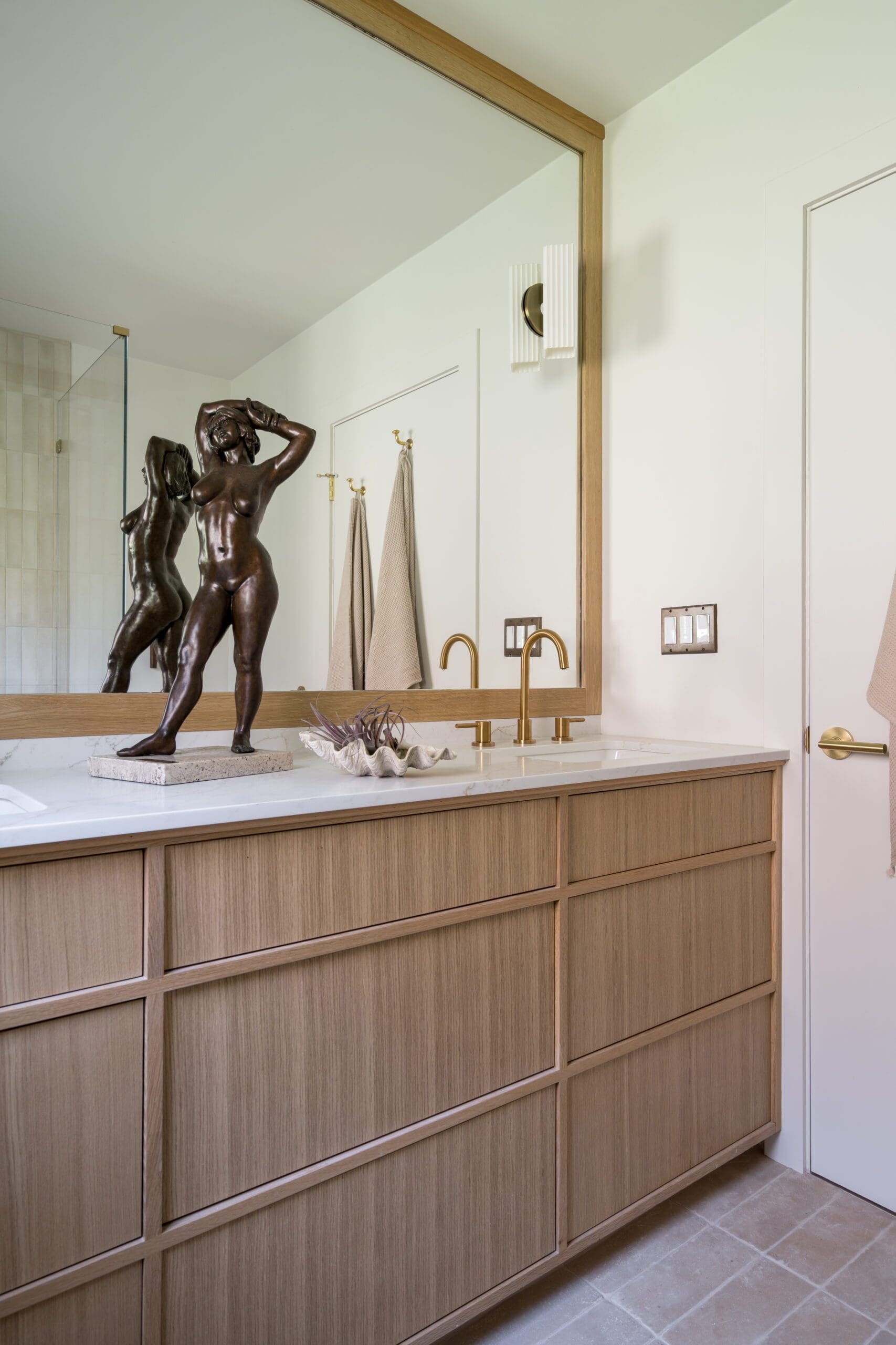 Statue on Bathroom Vanity