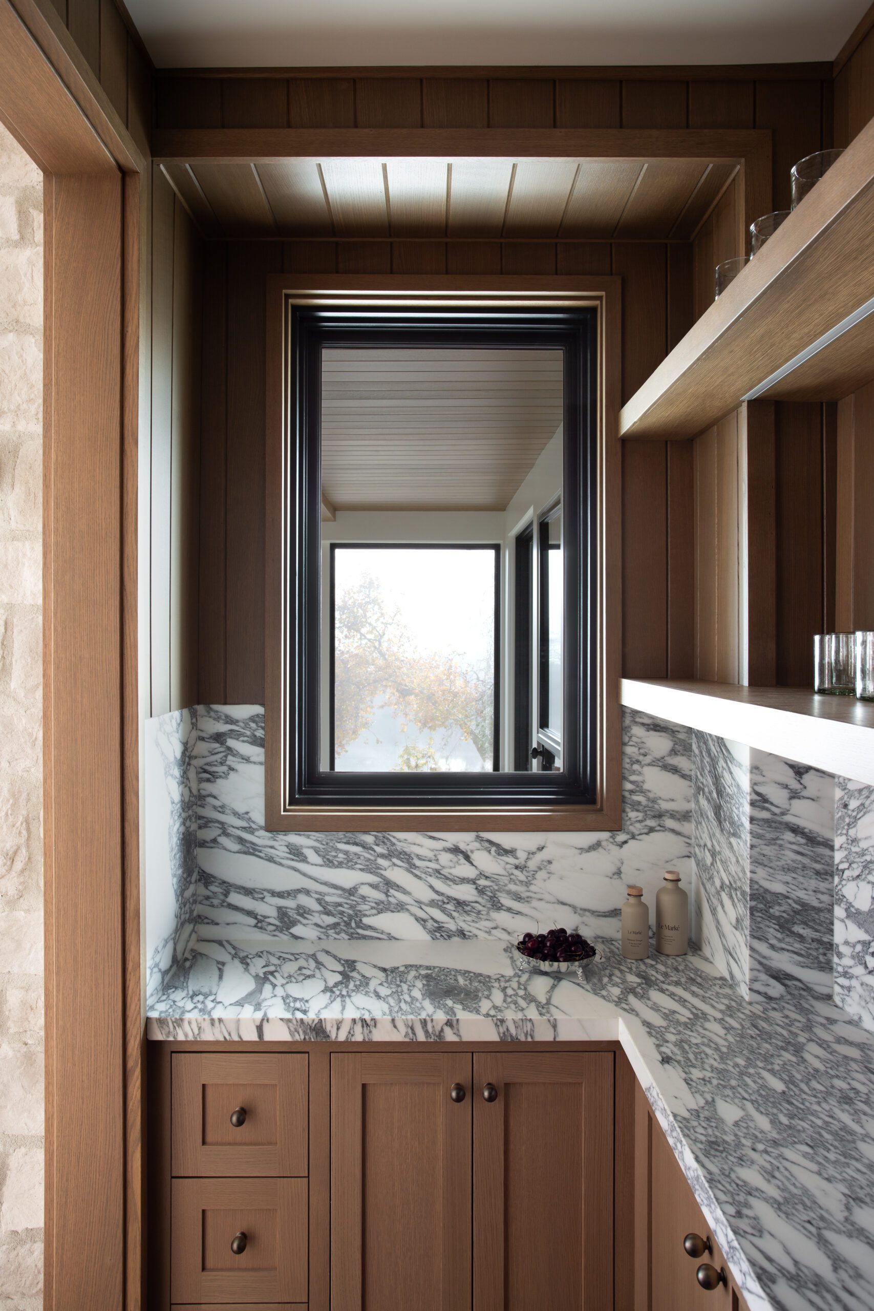 Marble countertops oak cabinets