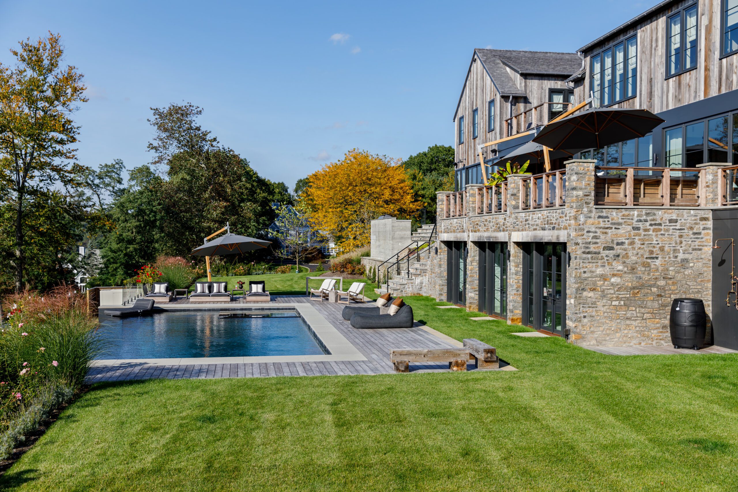 Exterior Stone Home Infinity Pool