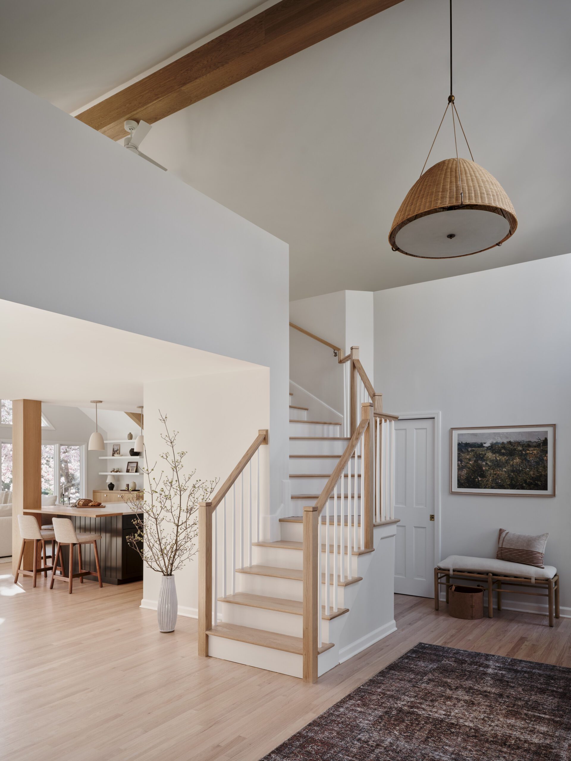 Entryway with wooden staircase