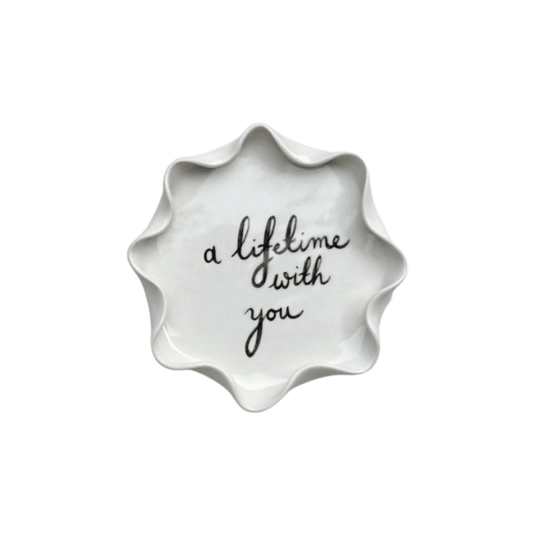 Ceramic wavy plate with scripture
