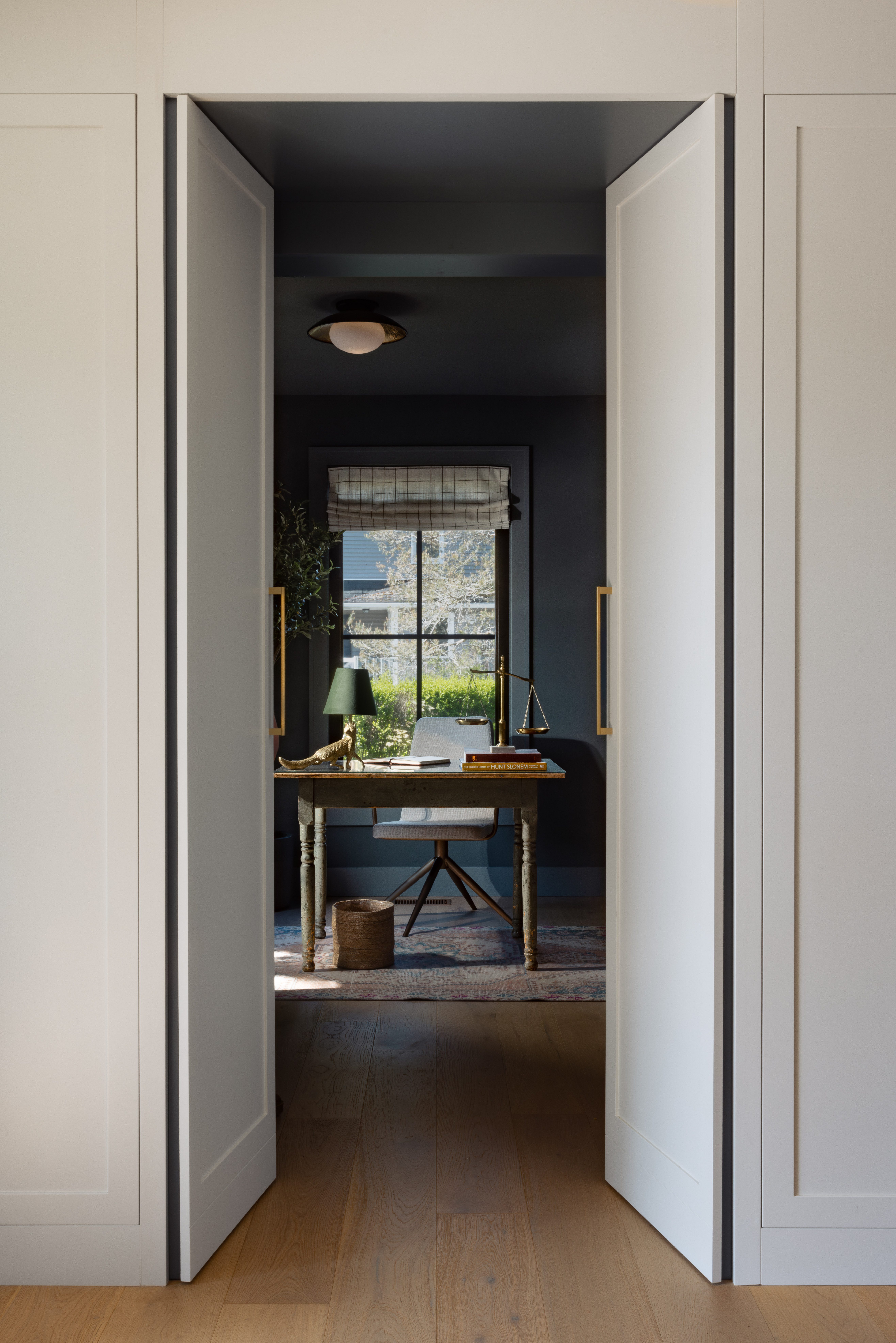 Hidden office inside cabinetry