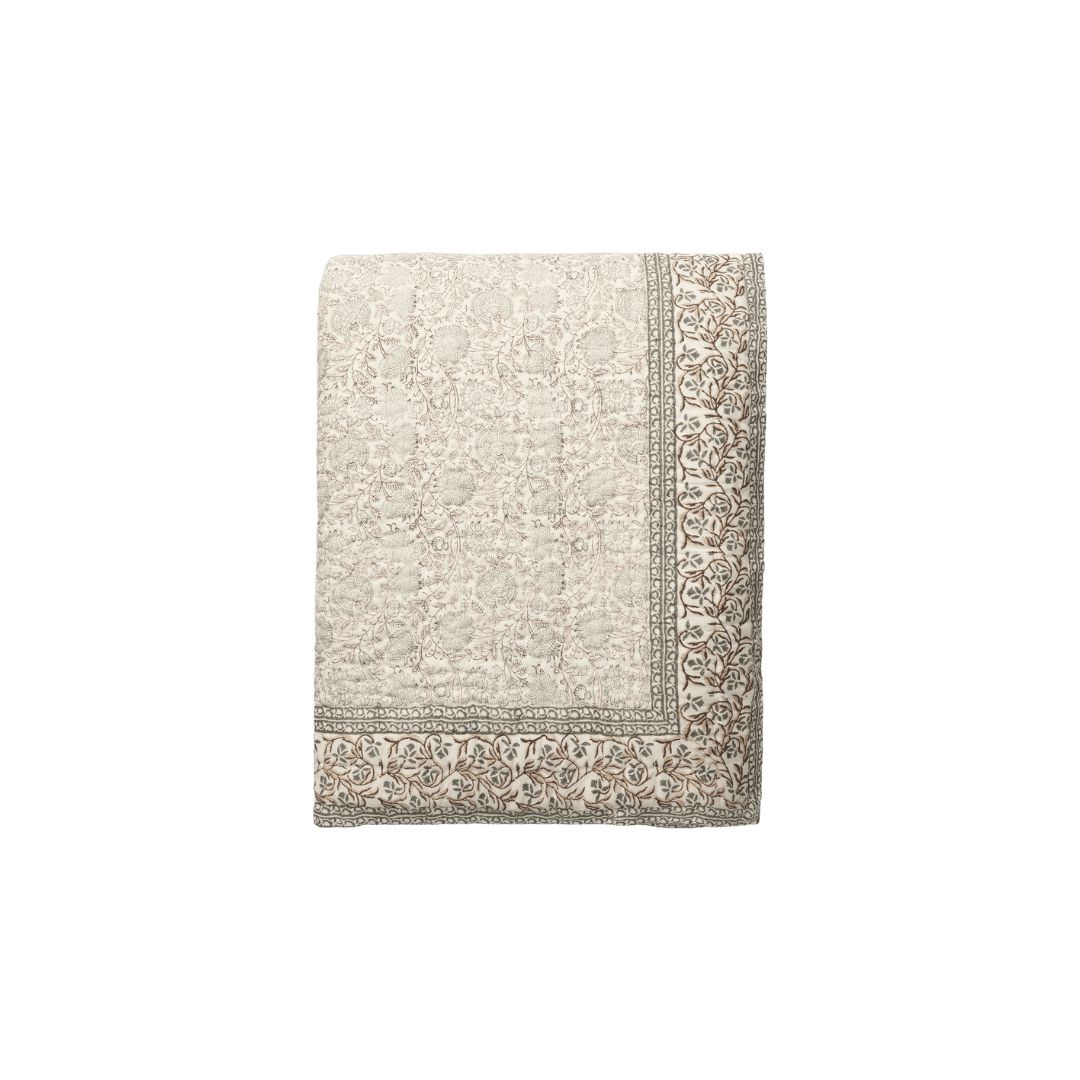 Floral block printed quilt for bedroom