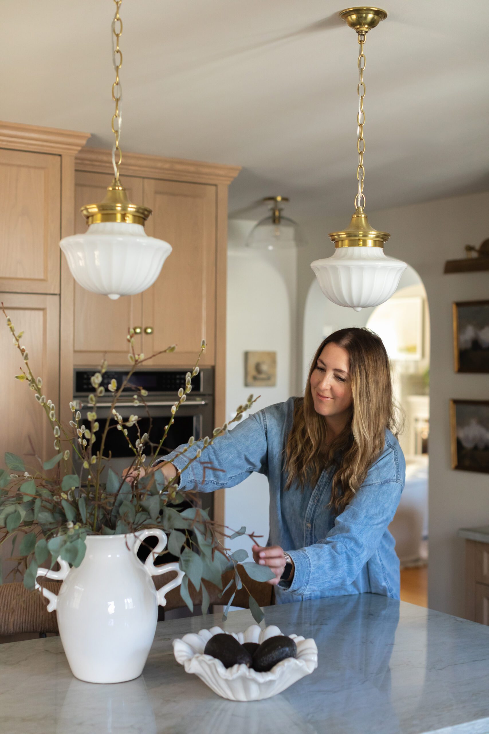 Styling flowers on countertop