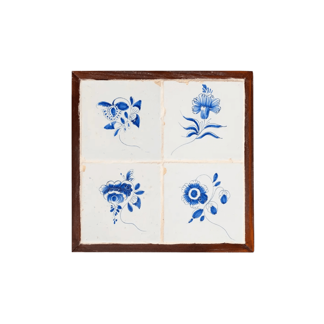 Framed set of floral delft tiles