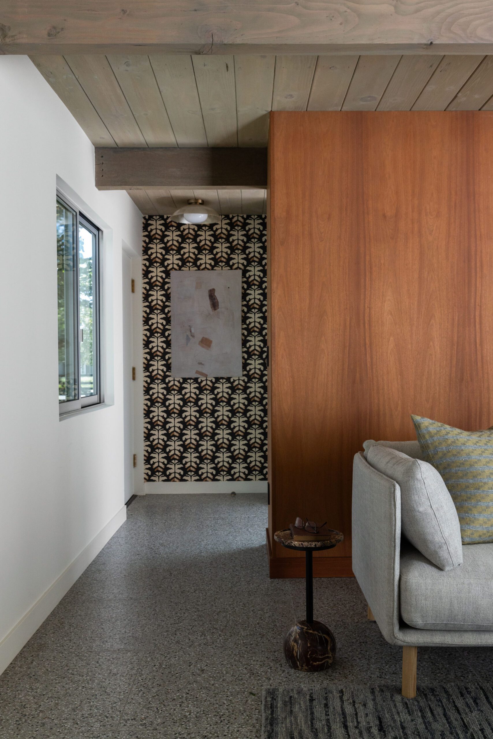 Wooden Panel and Wallpapered Wall